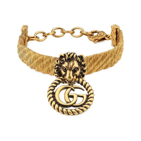 gucci lion head bracelet.